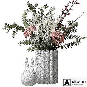 Bouquet with eucalyptus and flowers in a white vase