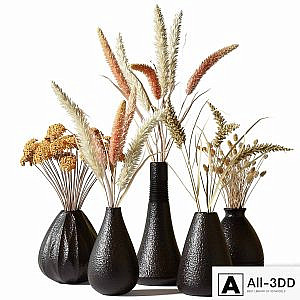 Set of bouquets of dried flowers in black clay vases