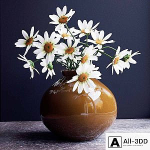A bouquet of flowers in a vase 9