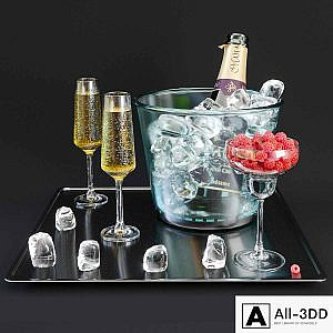 A bottle of champagne on a tray with ice and raspberries.