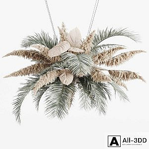 Hanging decor of palm leaves and pampas grass