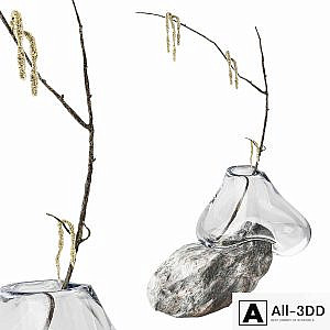 Branch with earrings in a sculpture vase by Laetitia Jacquetton