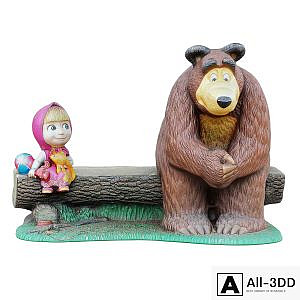 Sculpture of the characters Masha and the bear are sitting on a bench